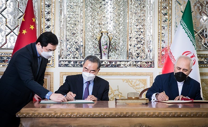 Iran-China cooperation agreement signing photo relevant to what is the Iran-China 25-year agreement
