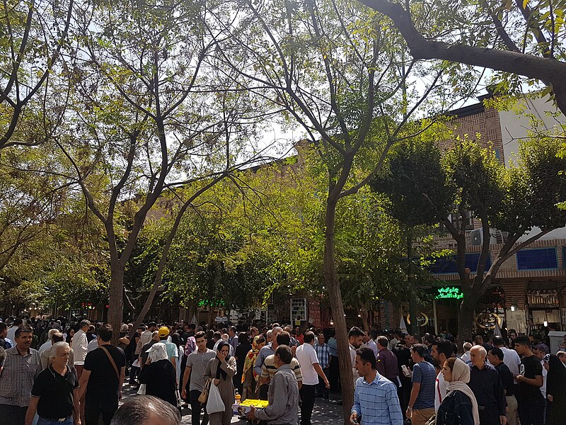 Tehran bazaar showing domestic economic context for Iran sanctions explained guide