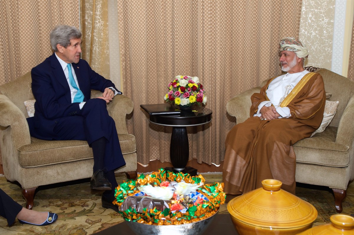 Omani and Western officials meeting in Muscat before Iran negotiations, illustrating mediation channels
